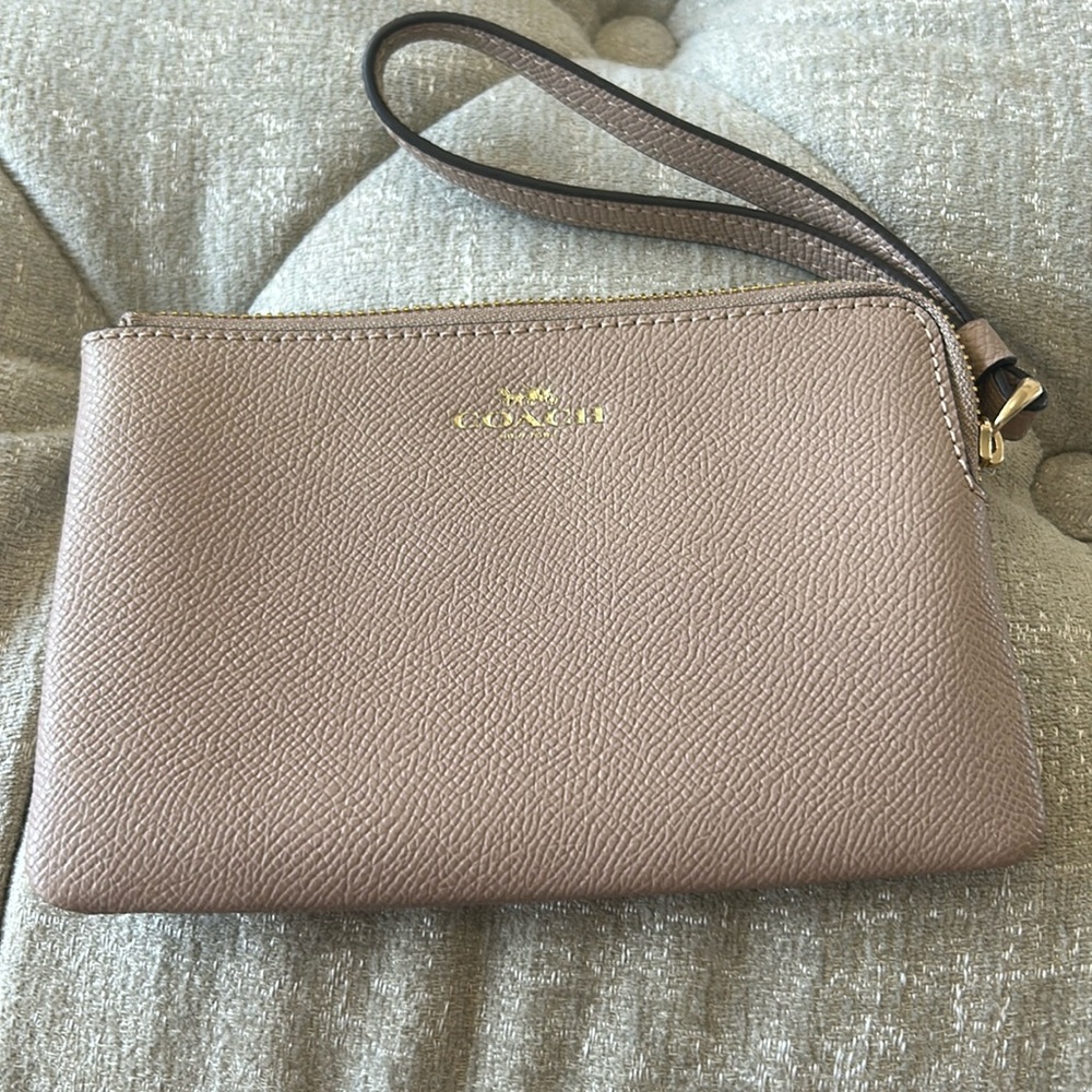 Coach wristlet 4 inches tall x 6 1/2 wide